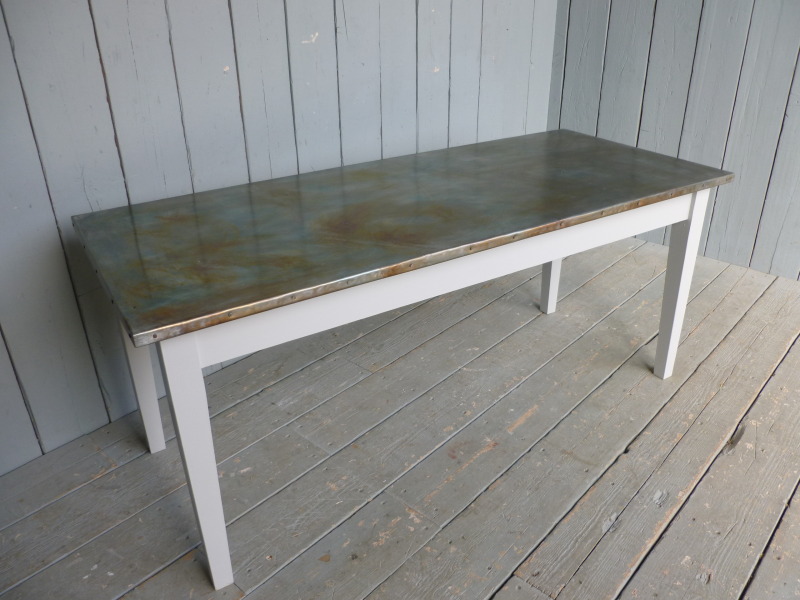 Custom built natural metal top table made from zinc in the UK add an industrial and vintage look to any kitchen